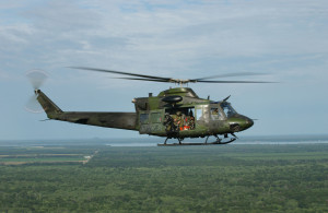 A Canadian CH-146 Griffon helicopter from the 430th Helicopter Squadron flies over Wisconsin July 16, 2006, during Patriot 2006. Patriot increases the war-fighting capabilities of the National Guard, reserve, and active components of the Air Force and Army. Additionally, Canadian, United Kingdom, and Dutch forces are participating, increasing combined effectiveness. (U.S. Air Force photo by Master Sgt. Robert A. Whitehead) (Released)